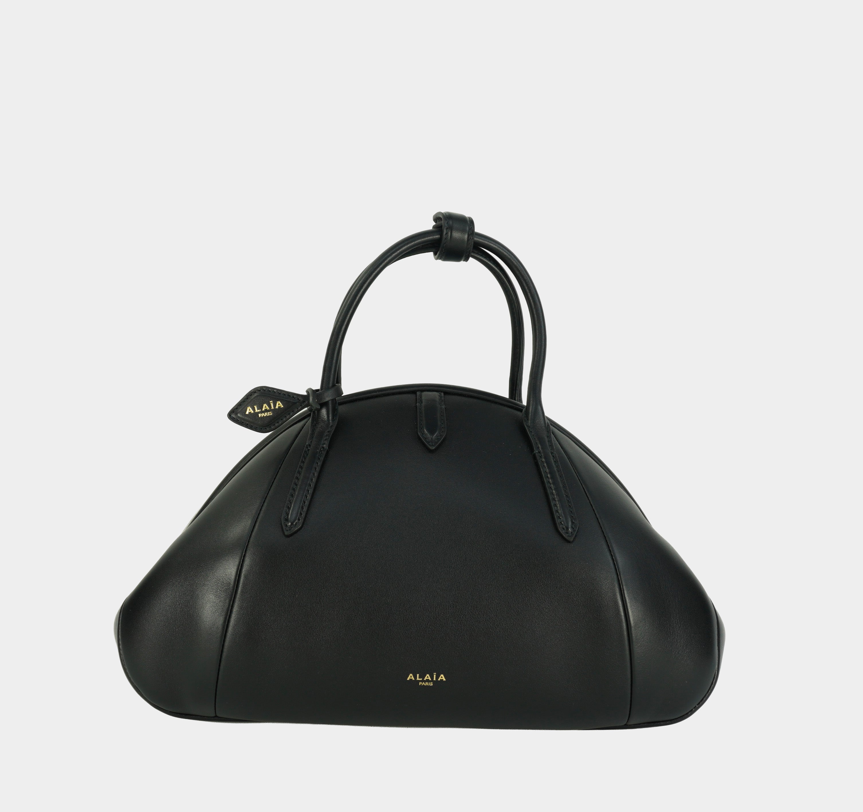 ALAÏA Purse Top handle bag in calfskin