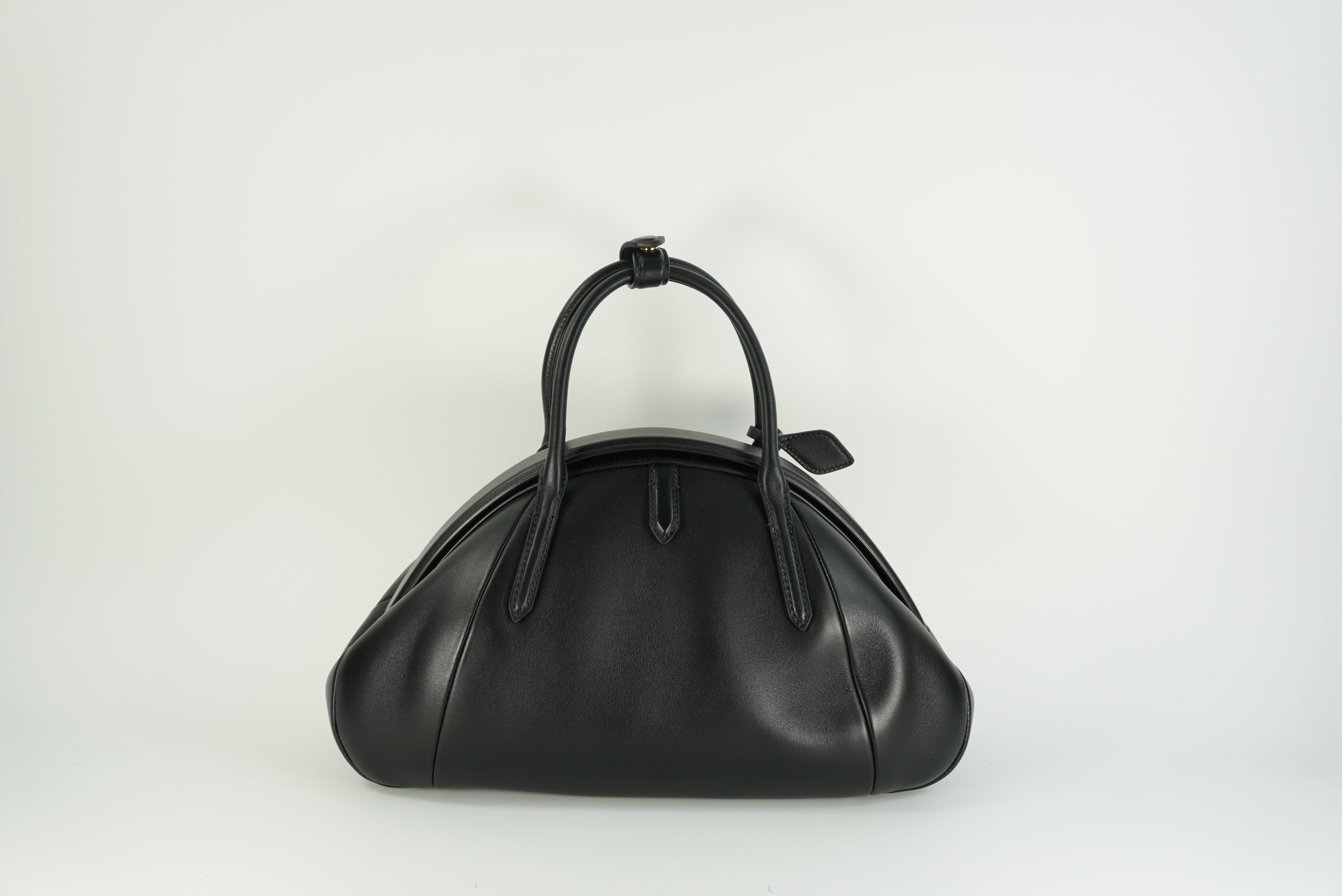 ALAÏA Purse Top handle bag in calfskin