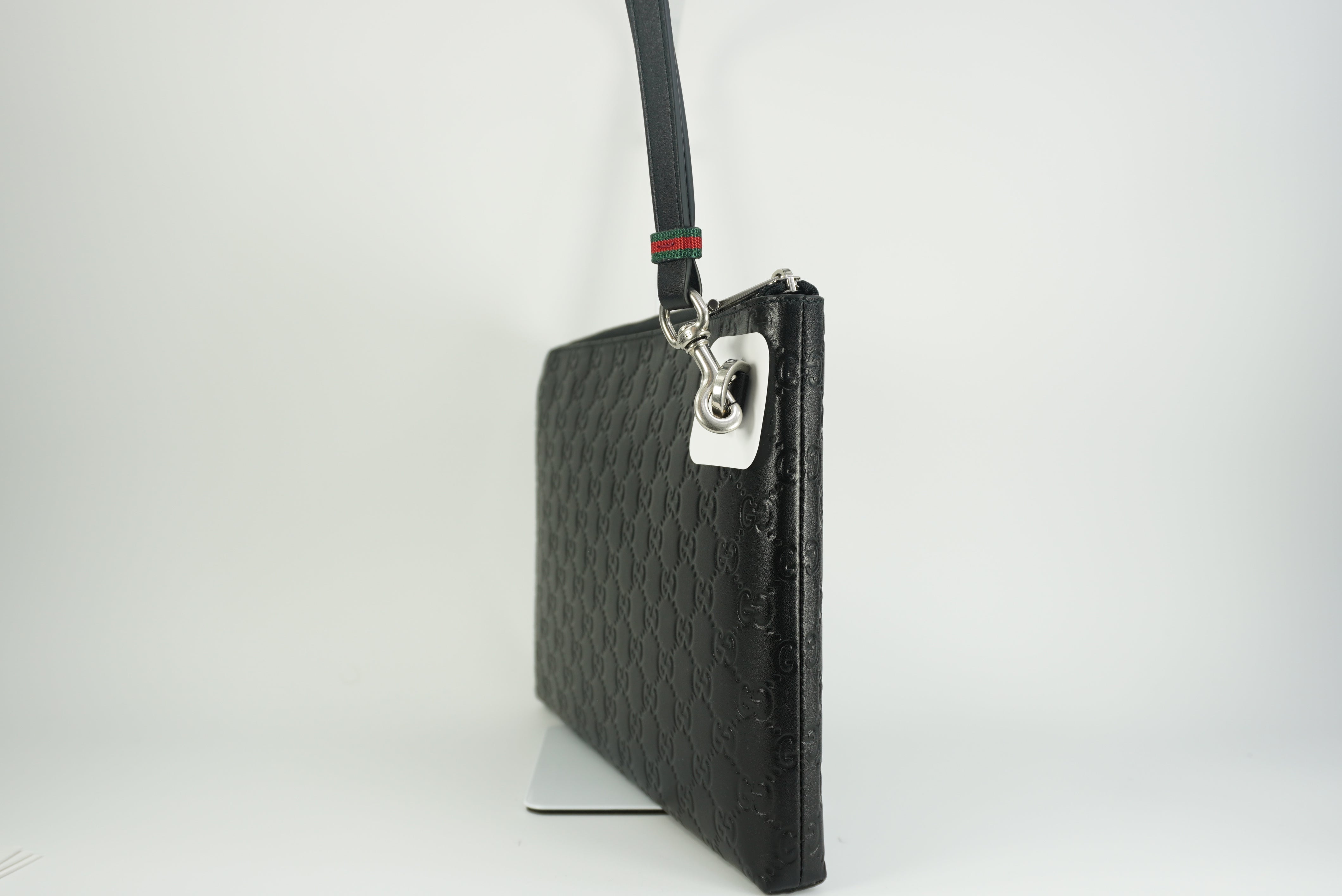 GUCCI GG Emblem medium pouch New Season