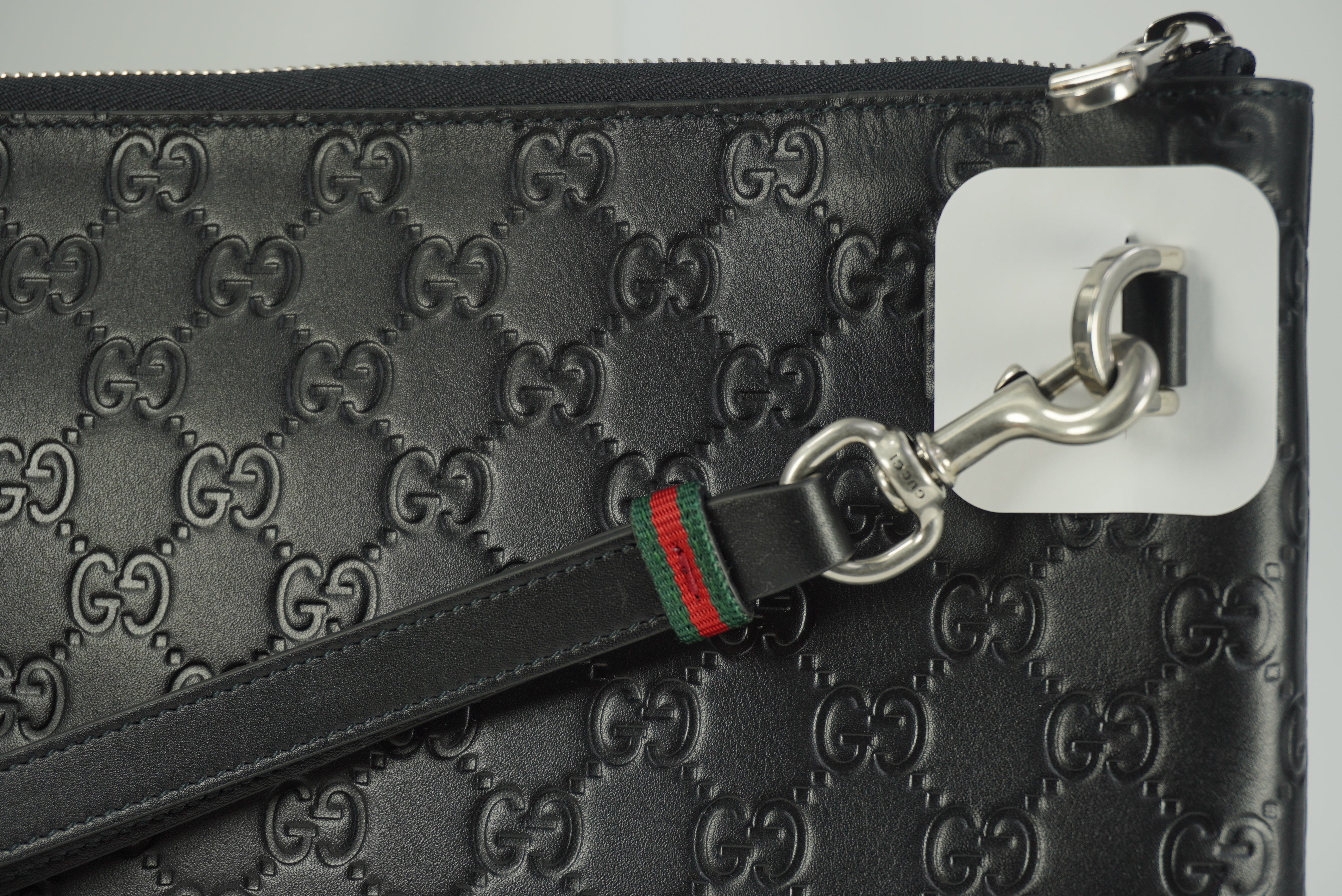 GUCCI GG Emblem medium pouch New Season