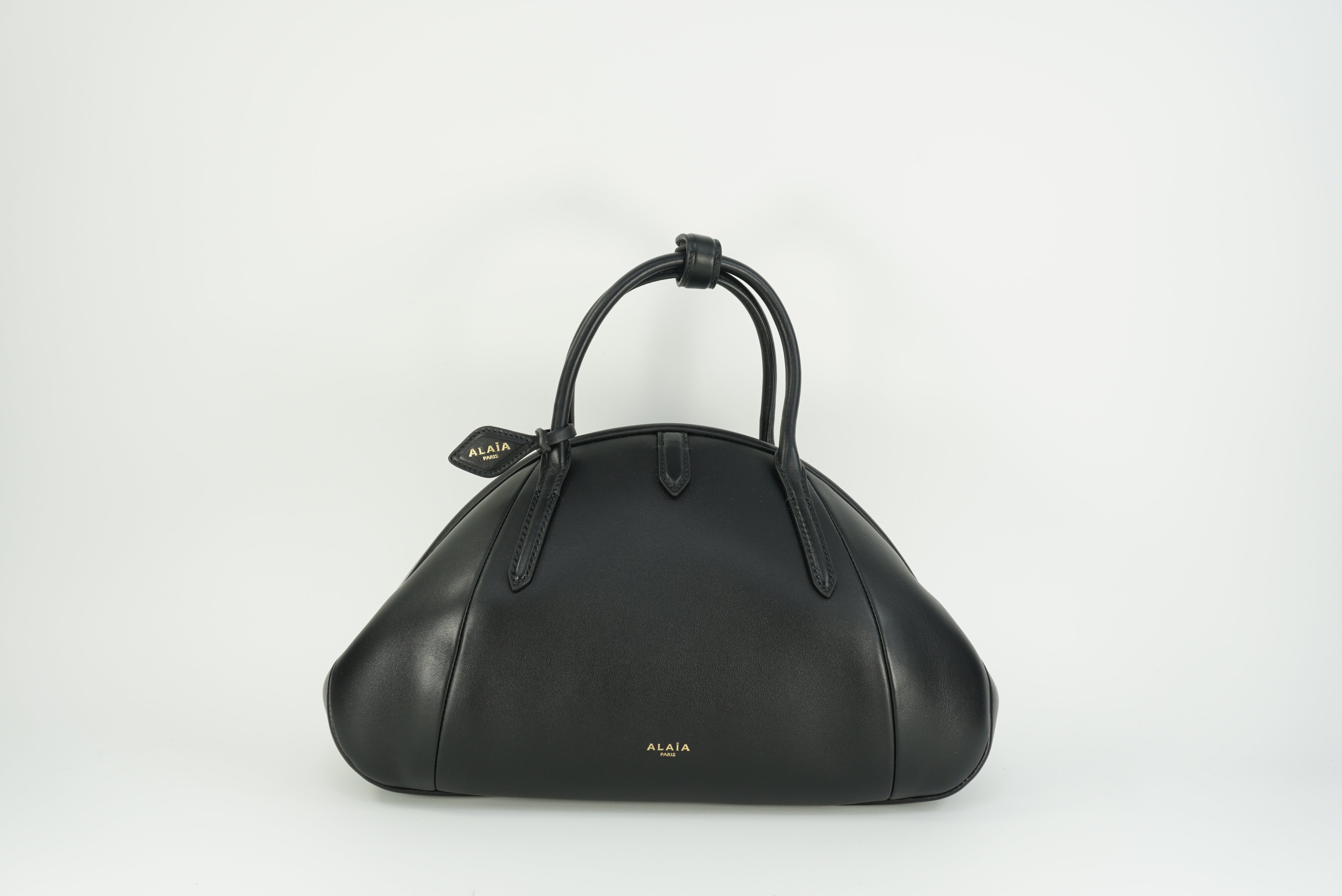 ALAÏA Purse Top handle bag in calfskin
