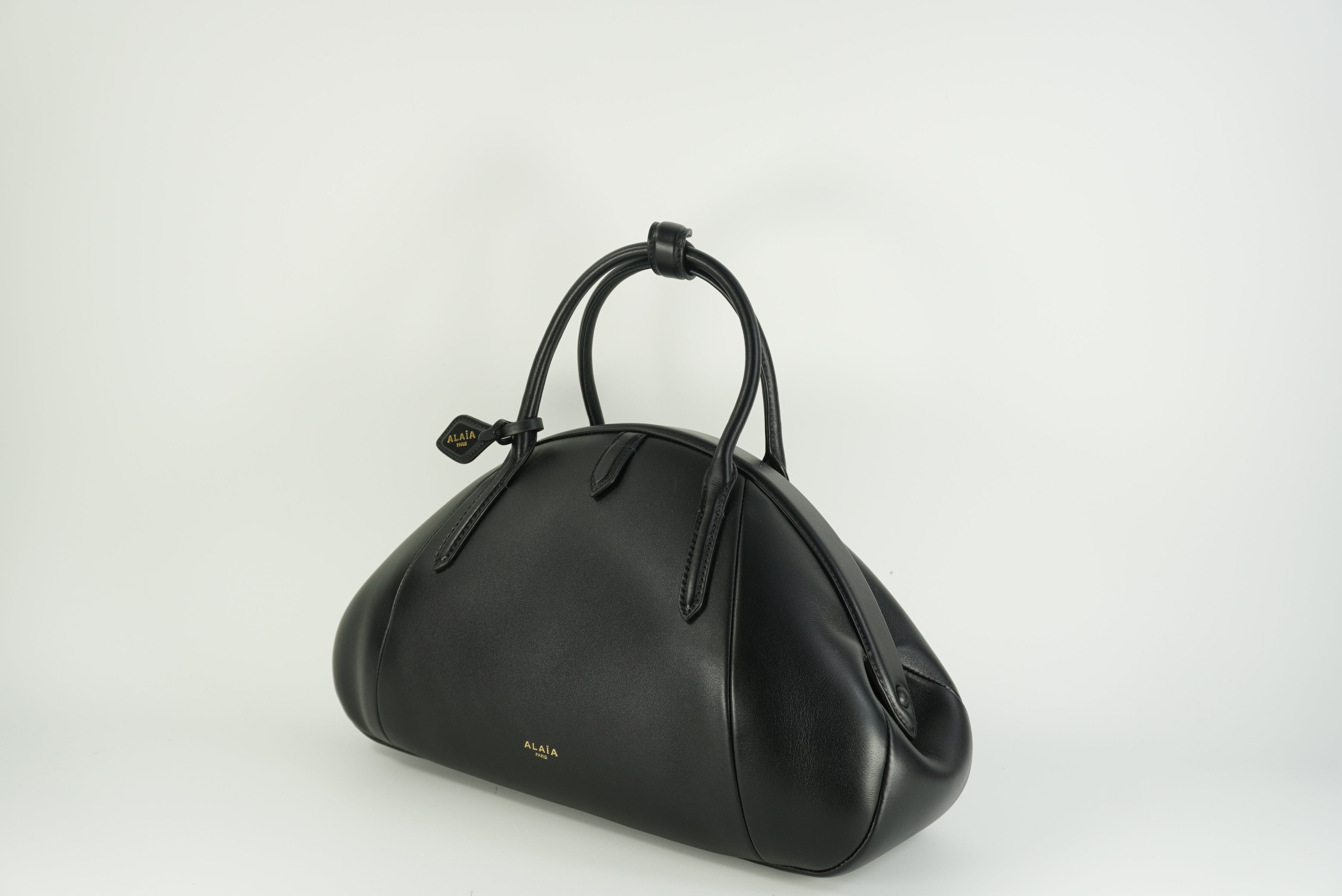 ALAÏA Purse Top handle bag in calfskin