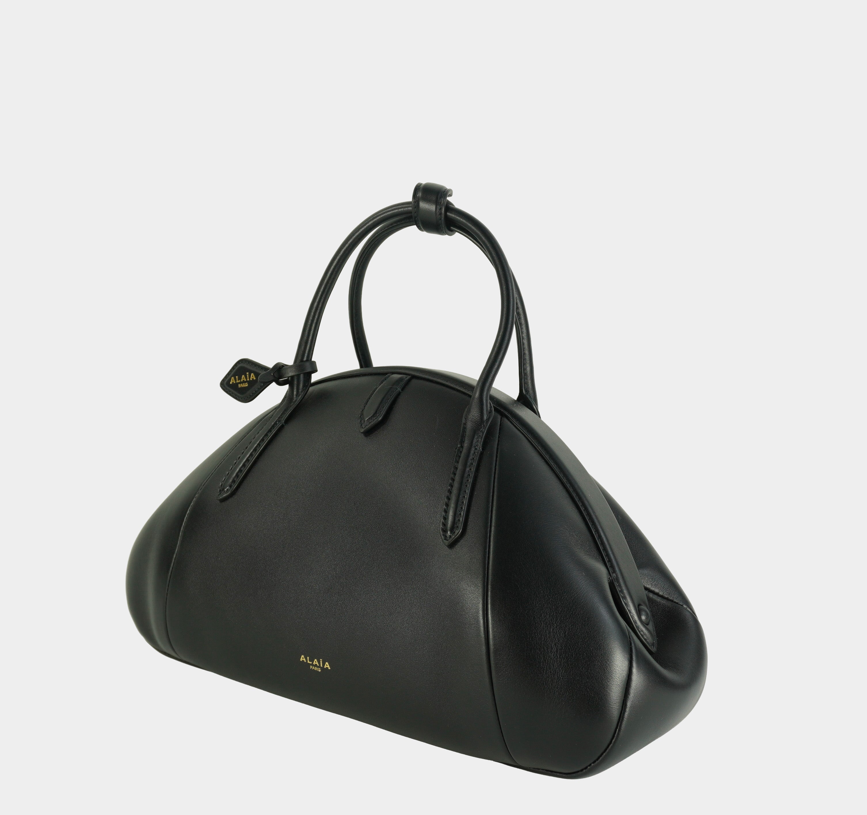 ALAÏA Purse Top handle bag in calfskin