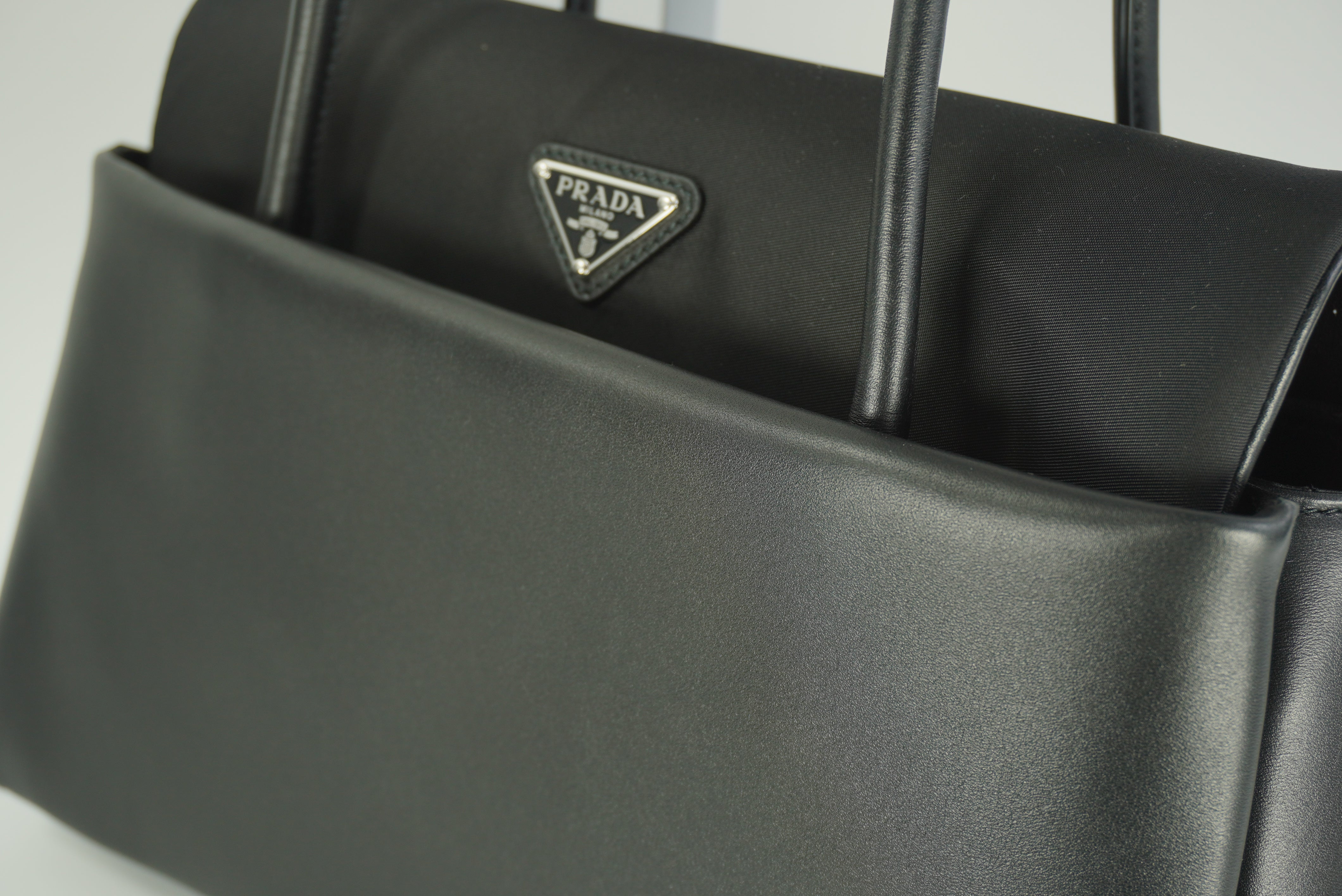 Prada Passage medium leather bag with Re-Nylon flap